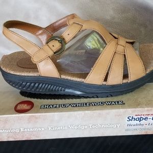 Sketchers original "Shape-ups" sandles.